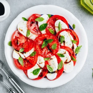 Mozzarella Caprese salad with fresh tomatoes and basil
